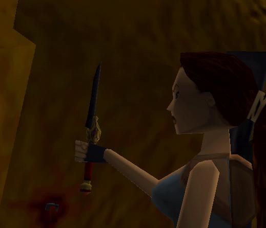 Lara admire le couteau